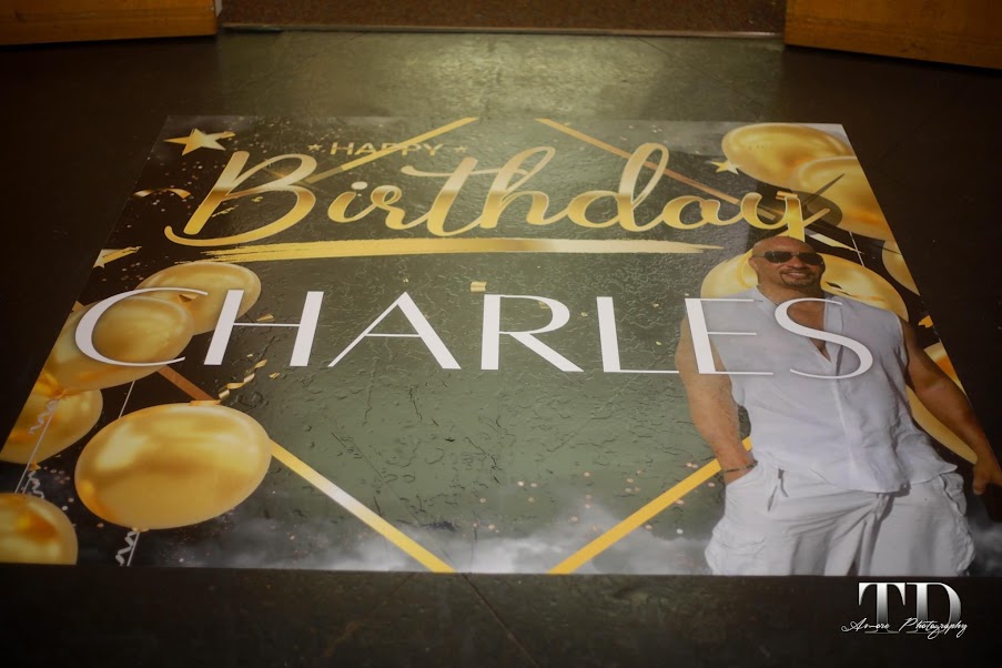 Custom Happy Birthday floor decal in gold and white for a birthday celebration