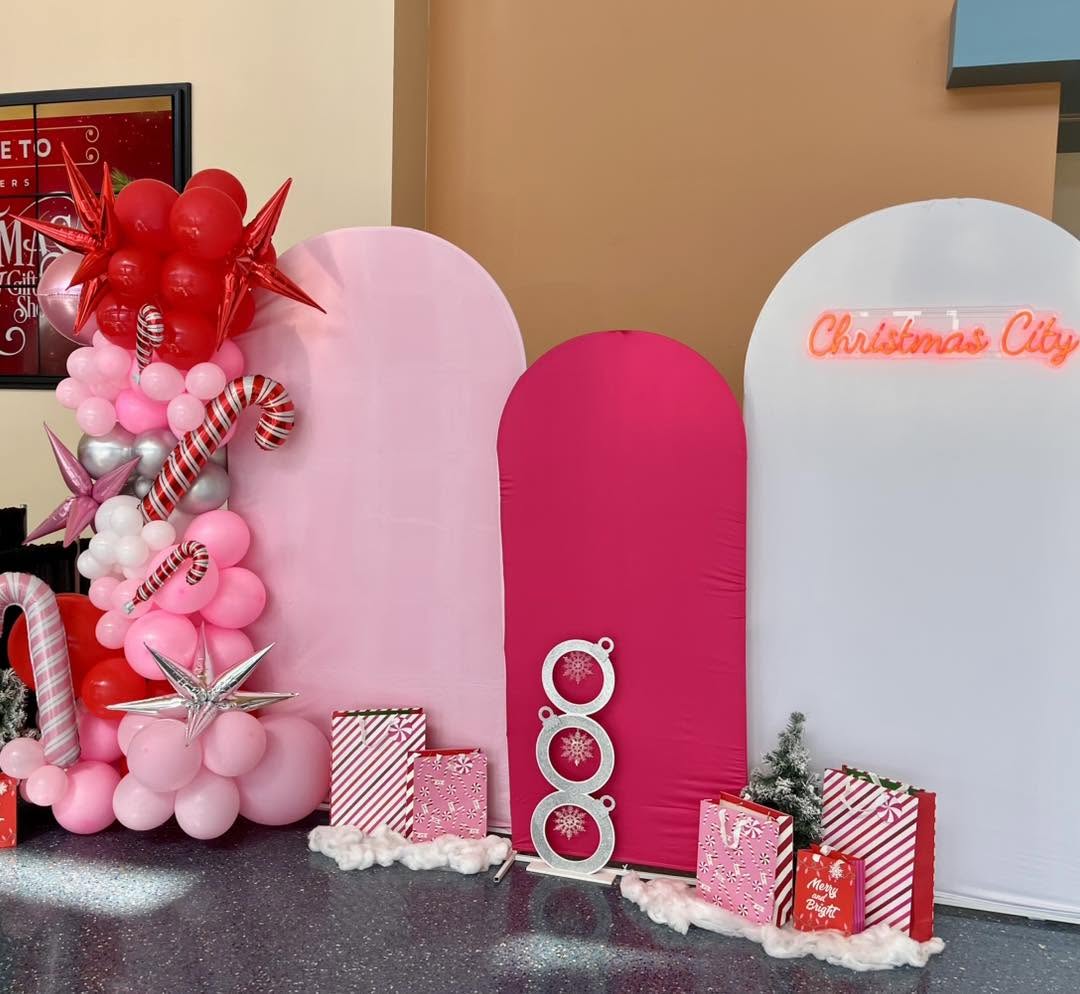 Pink and red Christmas balloon display