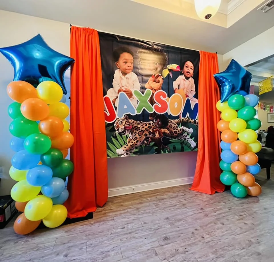 Custom cut-out character props used as party décor